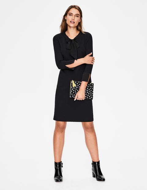 black dress and ankle boots outfit
