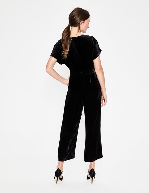 Aston Samt-Jumpsuit - Schwarz Aston Samt-Jumpsuit - Schwarz