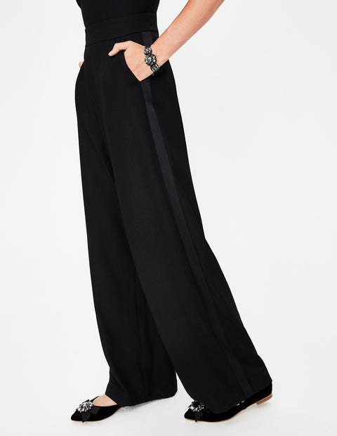 black jumpsuit with skirt