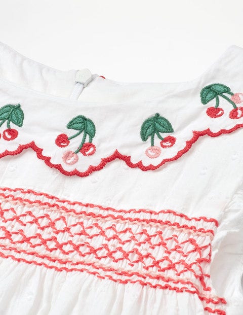 Frill Sleeve Smocked Dress - White Textured Dot/Cherries Frill Sleeve Smocked Dress - White Textured Dot/Cherries