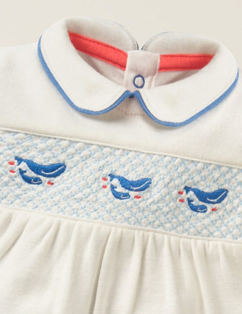 Grenouillère À Smocks Et Motif Baleine - Bébés baleines ivoire Grenouillère À Smocks Et Motif Baleine - Bébés baleines ivoire