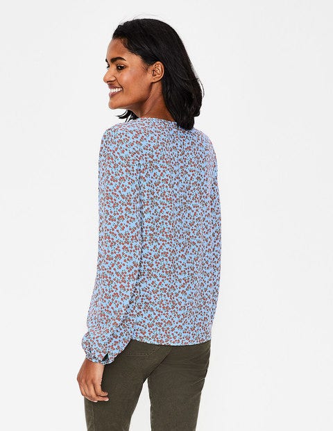 Chemisier Veronica - Motif Daisy Sprig bleu brumeux Chemisier Veronica - Motif Daisy Sprig bleu brumeux