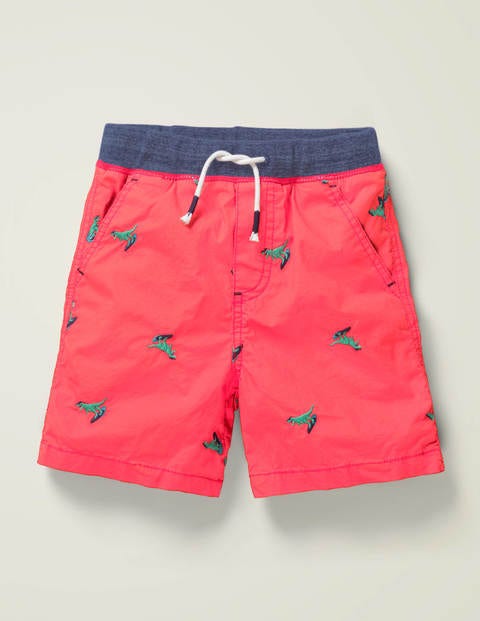 Fröhliche Urlaubsshorts - Malvenrot, Surfende Dinos Fröhliche Urlaubsshorts - Malvenrot, Surfende Dinos