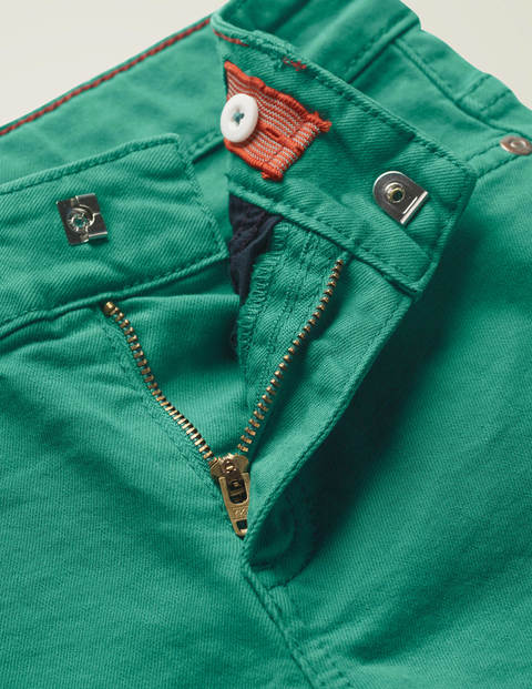 green denim trousers