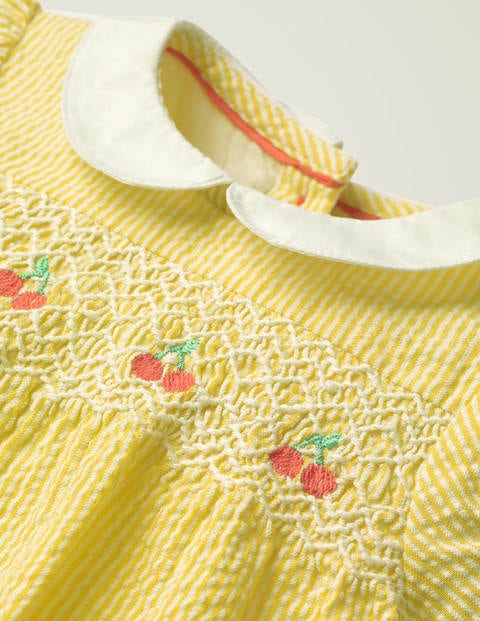 Robe rétro à smocks - Motif floral coutil jaune jonquille Robe rétro à smocks - Motif floral coutil jaune jonquille