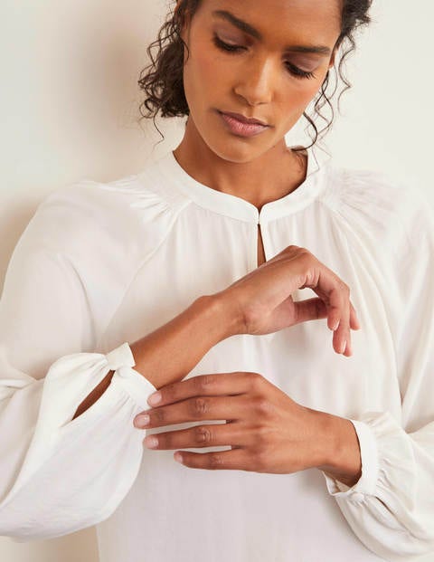 smocked neck blouse