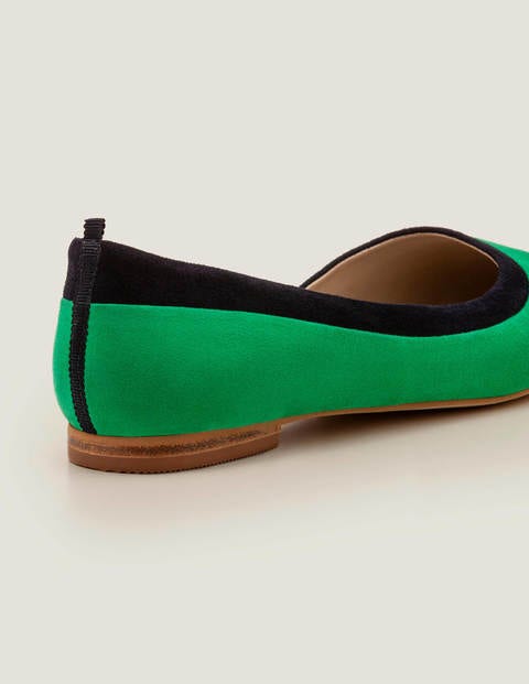 green pointed flats