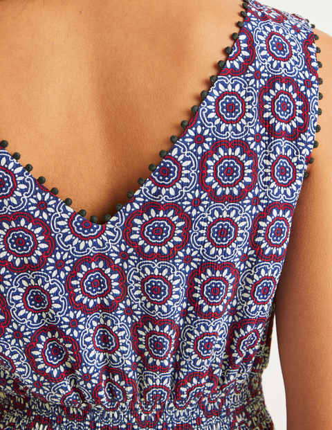 Elisa Jumpsuit Mit Bommelborte - Kräftiges Blau, Sonnenmuster Elisa Jumpsuit Mit Bommelborte - Kräftiges Blau, Sonnenmuster