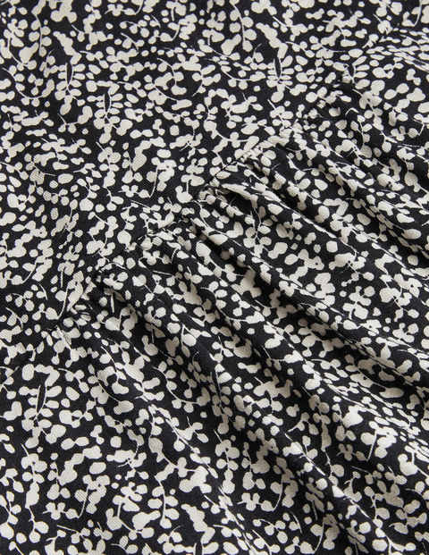 Cara Midikleid - Schwarz und Naturweiß, Ranken mit Knospen Cara Midikleid - Schwarz und Naturweiß, Ranken mit Knospen