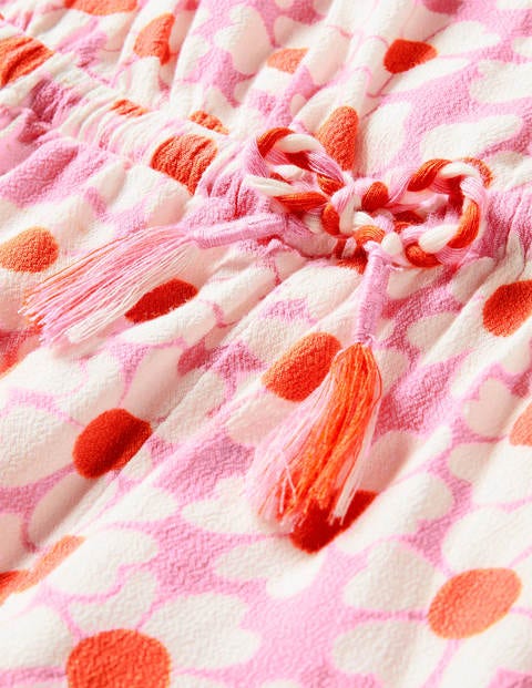 Combishort tissé à pampilles - Lit de pâquerettes rose fleur de prunier Combishort tissé à pampilles - Lit de pâquerettes rose fleur de prunier