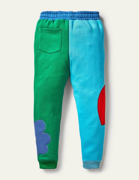 Jogginghose mit Blockfarben und Applikation - Wasserblau/Paprikagrün, Blumen Jogginghose mit Blockfarben und Applikation - Wasserblau/Paprikagrün, Blumen