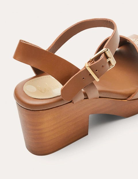 heeled clogs with strap