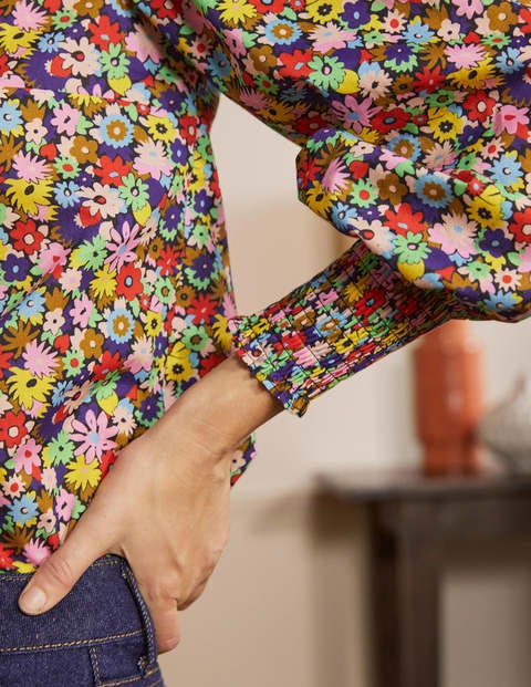 Baumwolloberteil mit gesmokten Bündchen - Kirschrot, Bunte Gänseblümchen Baumwolloberteil mit gesmokten Bündchen - Kirschrot, Bunte Gänseblümchen