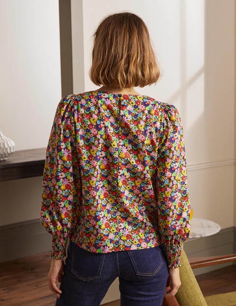 Baumwolloberteil mit gesmokten Bündchen - Kirschrot, Bunte Gänseblümchen Baumwolloberteil mit gesmokten Bündchen - Kirschrot, Bunte Gänseblümchen