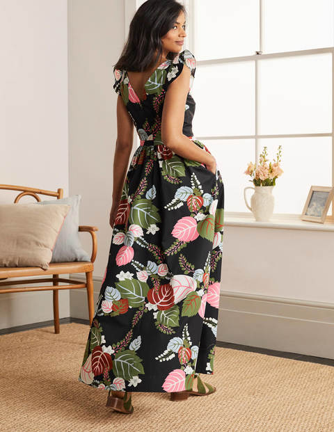Andrea Maxikleid mit Rüschenärmeln - Schwarz, Tropischer Urlaub Andrea Maxikleid mit Rüschenärmeln - Schwarz, Tropischer Urlaub