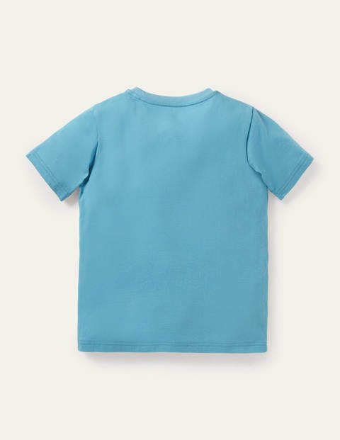 T-Shirt mit Eiersuche-Aufklappmotiv - Surfbrett-Blau, Hase
