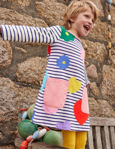 Fröhliches Jerseykleid mit Taschen - Naturweiß/Blau, Regenbogenfarbene Blumen Fröhliches Jerseykleid mit Taschen - Naturweiß/Blau, Regenbogenfarbene Blumen