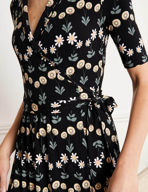 Lavinia Wickelkleid aus Jersey - Schwarz, Zarte Gänseblümchen