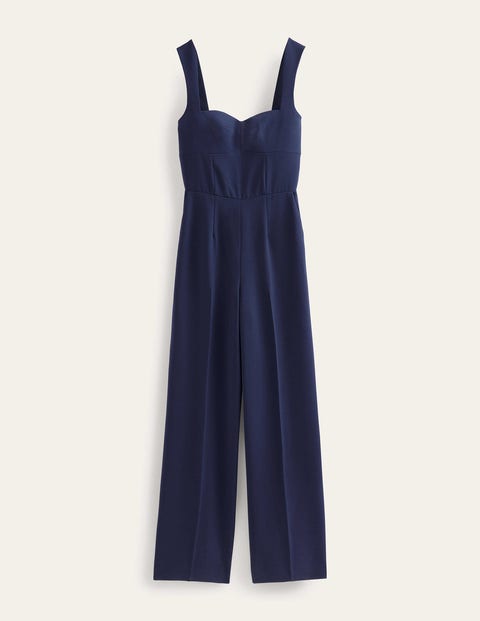 Erika Marineblauer Jumpsuit mit tiefem Ausschnitt und