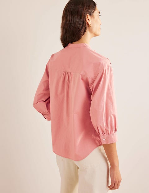pink shirt with rose