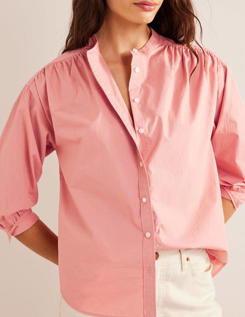pink shirt with rose