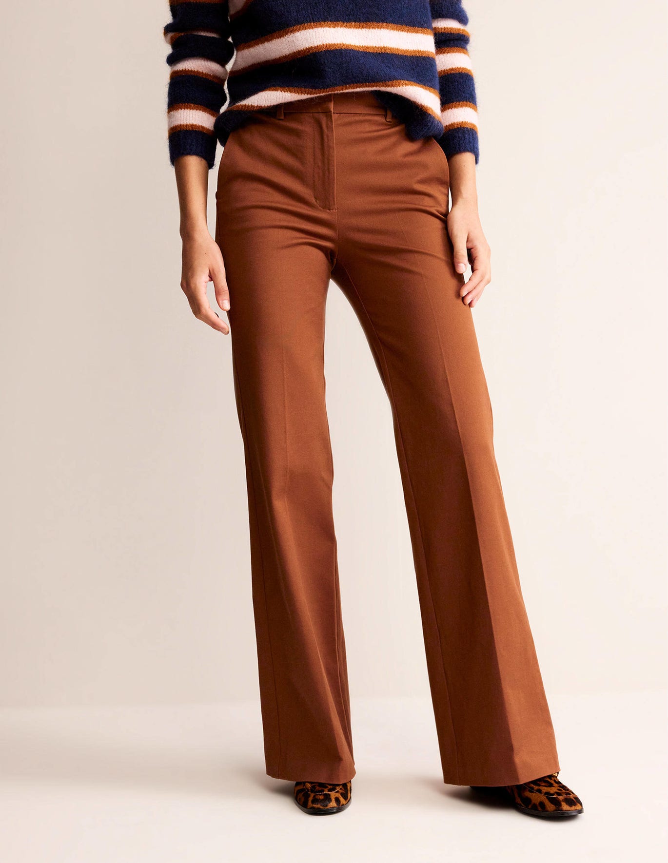 2. The Contemporary Scandi Chic: Simplicity reigns supreme in this aesthetic, a minimalistic capsule wardrobe takes center stage. Think quality basics, timeless trench coats, oversized blazers, and understated jewelry. The result? An effortlessly elegant and 'put-together' ensemble that exudes sophistication.

The power of a well-crafted pair of trousers can sculpt your entire ensemble, plus this season, stripes reign supreme. These versatile pieces below can become the cornerstones of your autumn scandi-chic wardrobe. Currently, you can also get 20% off from Boden DE when you buy 3 or more selected pieces with the code: P9N3.