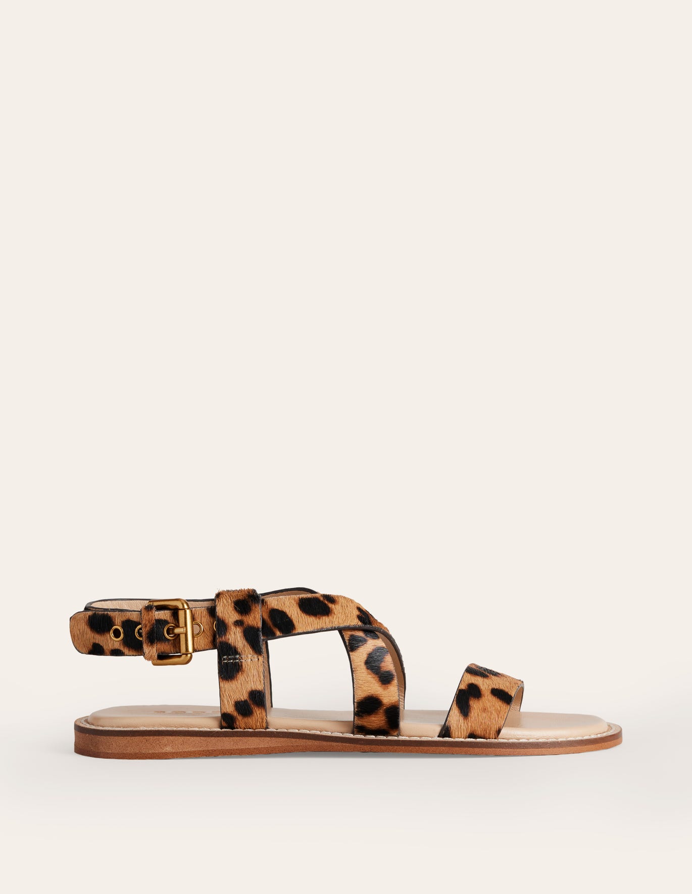 These Boden leopard pony sandals feature an adjustable cross-over strap and light padding underneath the foot to make sure they feel just as good as they look. 