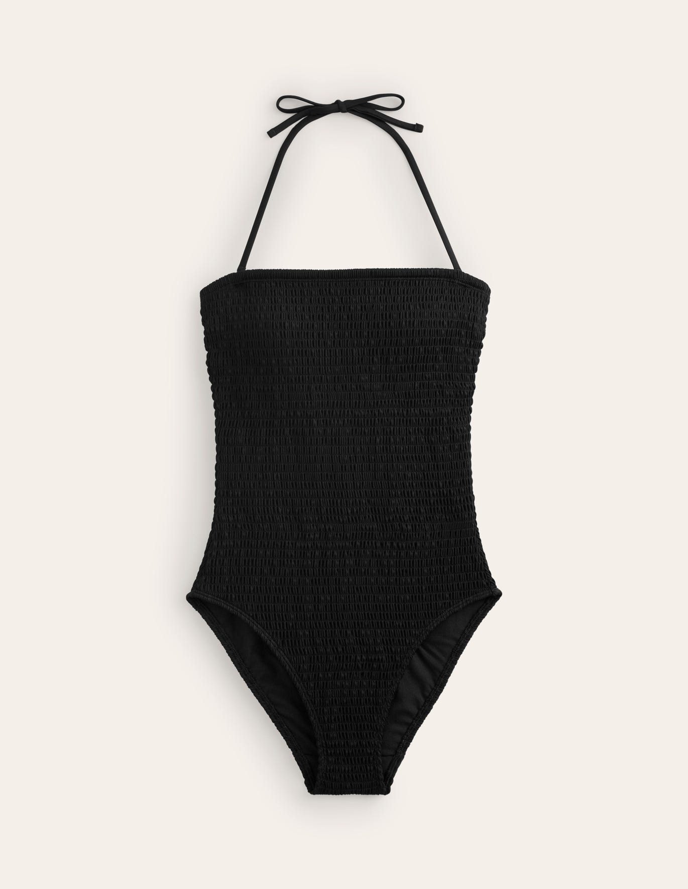 Boden black 
This classic bandeau swimsuit features all-over smocked detailing and a high-leg silhouette. Its fixed cups and silicone tape at the neckline make for a comfortable, supported fit.
