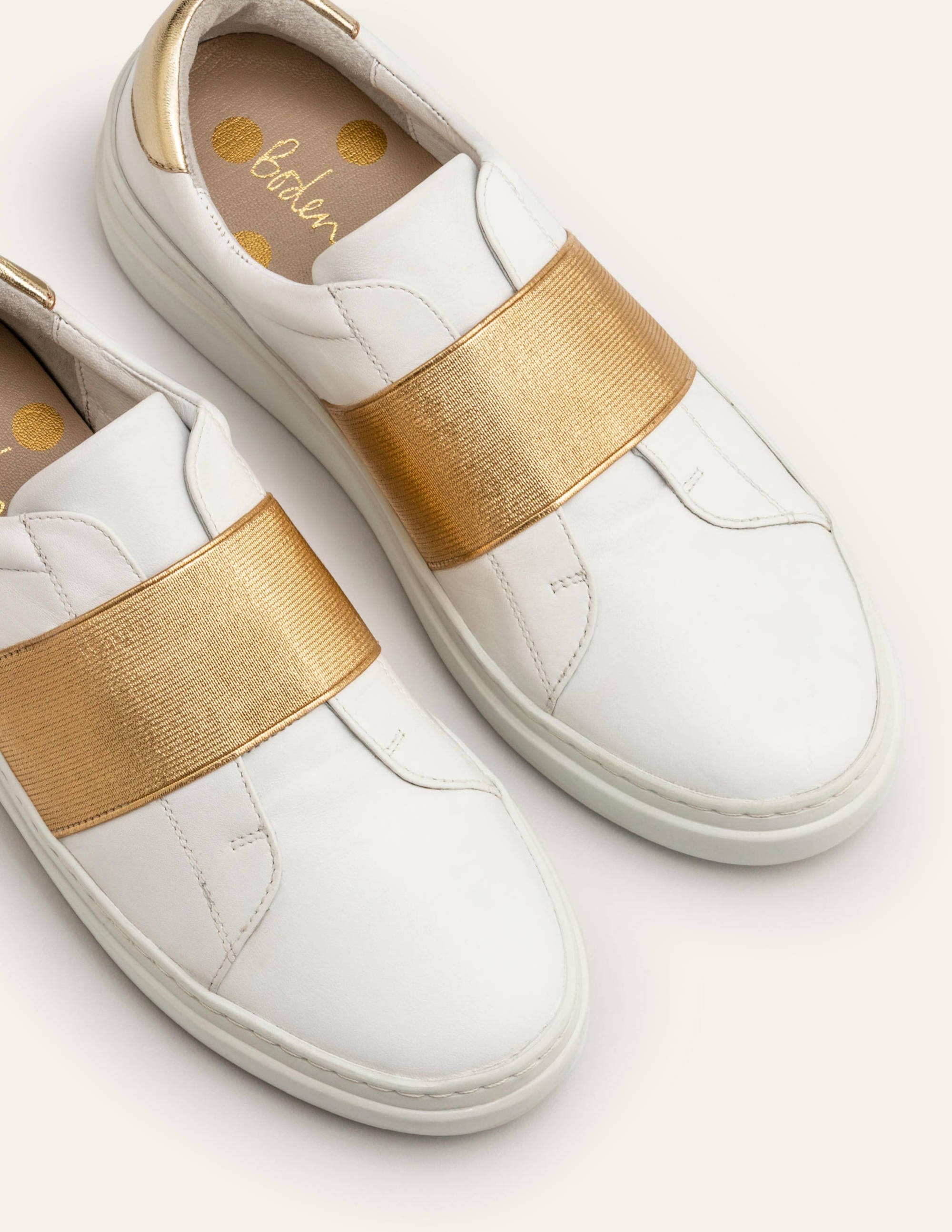 gold slip on trainers