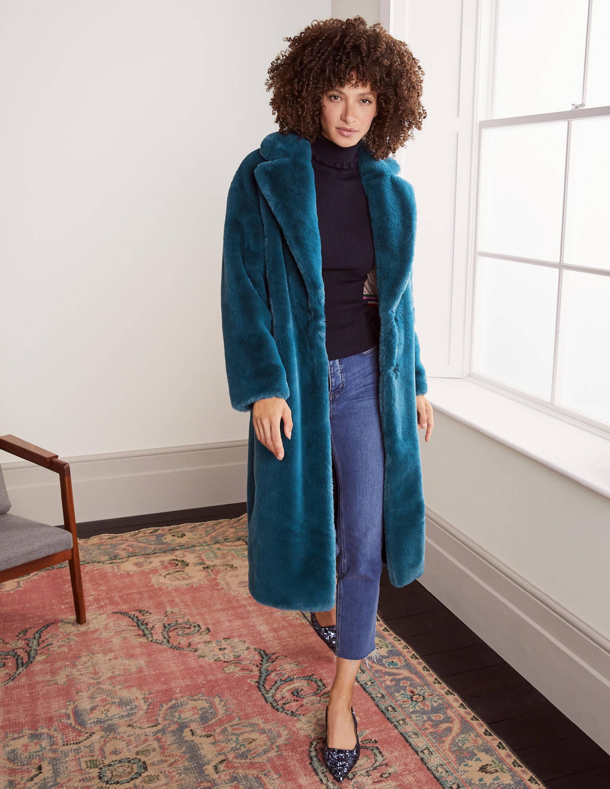 teal fur coat